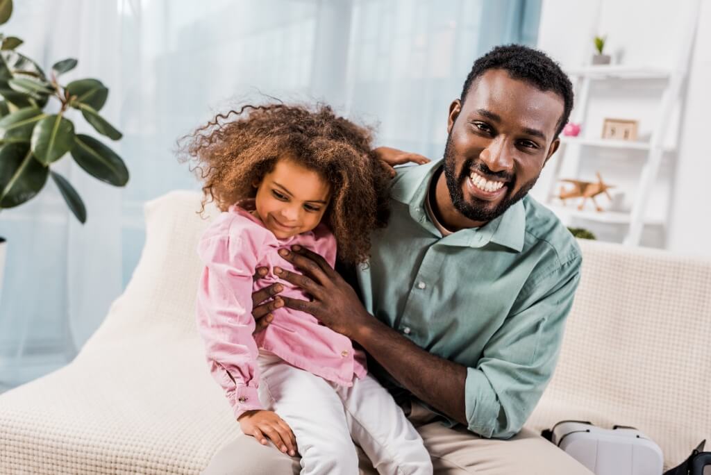 Daughter Smiling With Her Dad