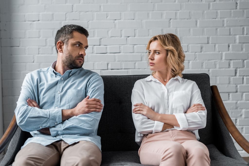 Couple Looking At Each Other Angrily